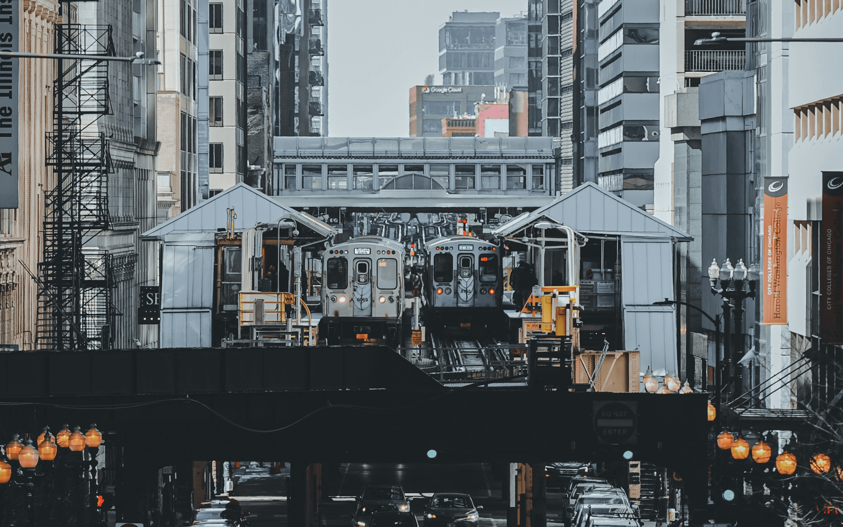 Chicago CTA Red Line train crossing elevated tracks above a busy city street
